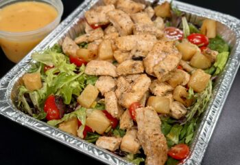 FAMILY DINNER - Blackened Chicken over Tropical Salad